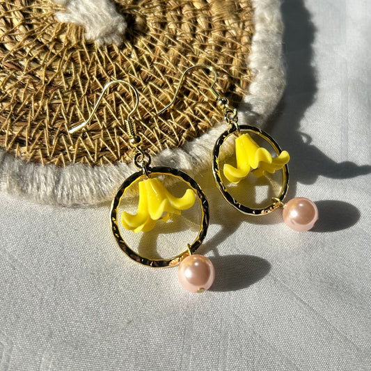 Yellow Puakenikeni with pink shell pearl , hoop